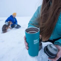 Klean Kanteen Insulated TK Wide With Café Cap 473ml - Brushed Steel -Outdoor Products Sales K16TKWPCC EB bottle in snow lifestyle